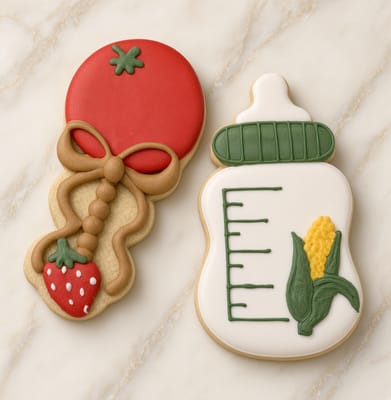 Garden baby shower cookies — tomato rattle and baby bottle with corn — custom decorated cookies by Dreams of Buttercream