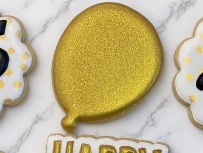 Gold glitter balloon cookie with a Happy Birthday plaque — custom decorated cookies by Dreams of Buttercream